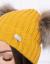 Kepurė su kailiukais Mailė (geltona)